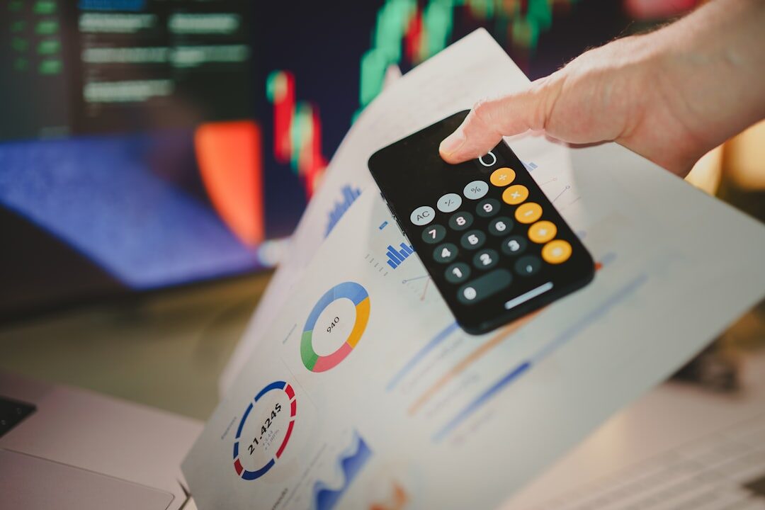 Marketing analyst reviewing performance data on screen