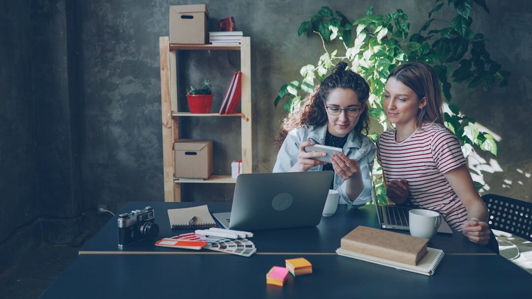 Team of digital marketing specialists smiling in office